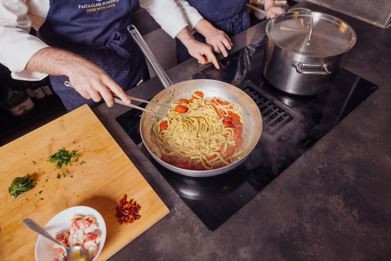 chef cooking pasta