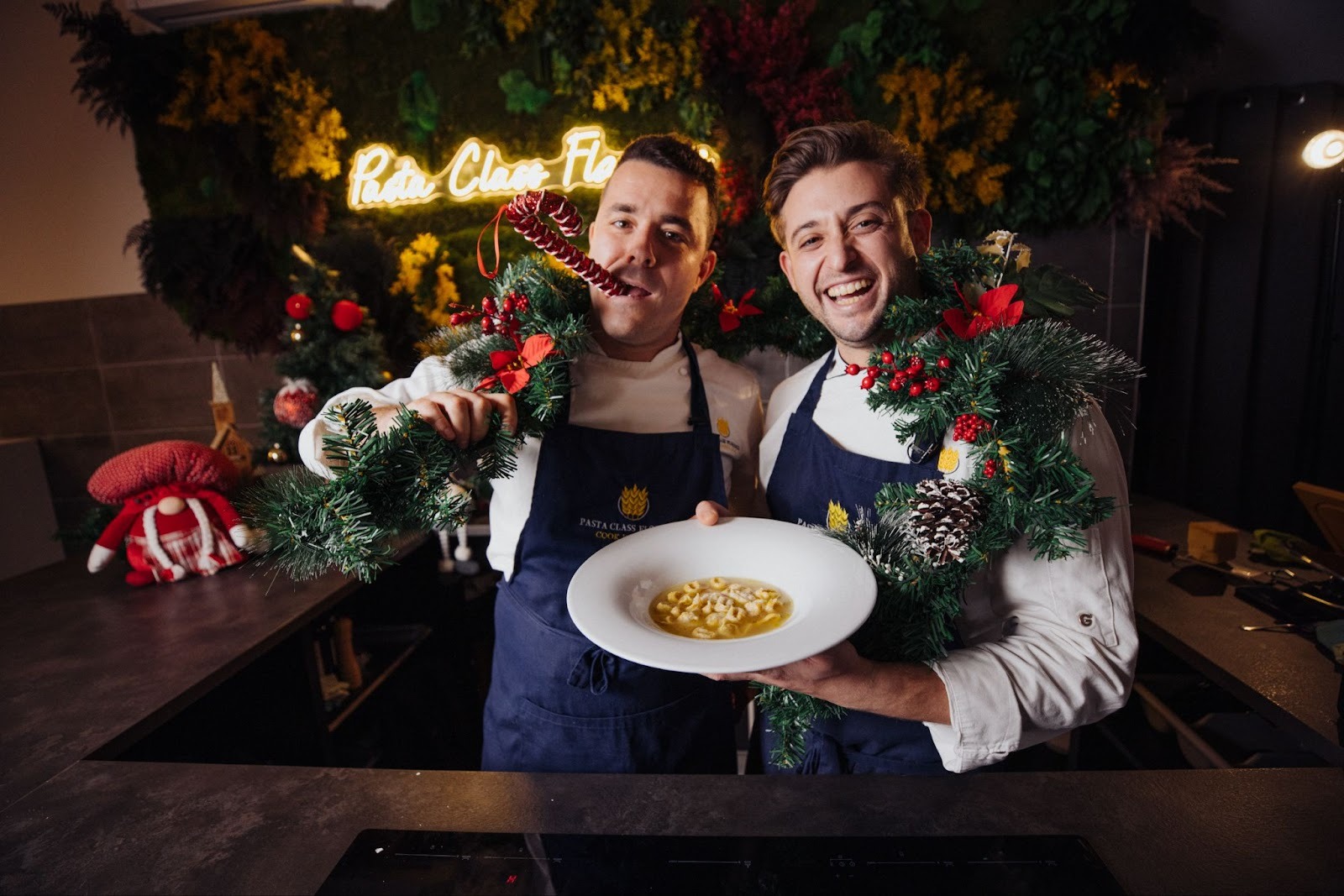 two chef with a christmas recipe tortellini in brodo