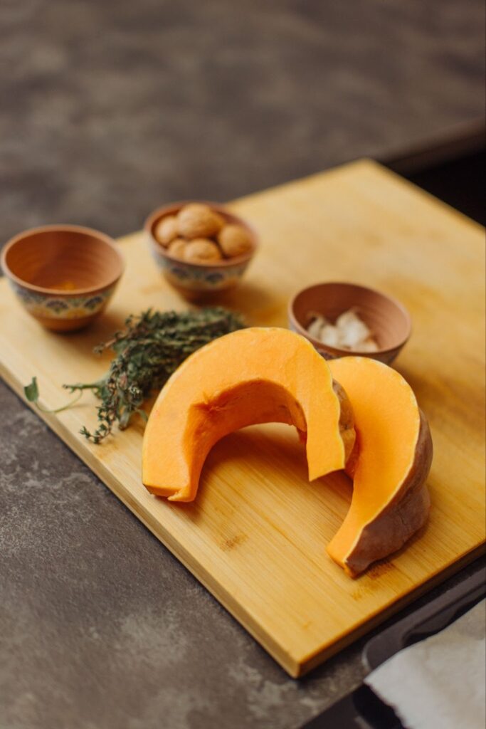 pumpkin with amaretti cookies on the table