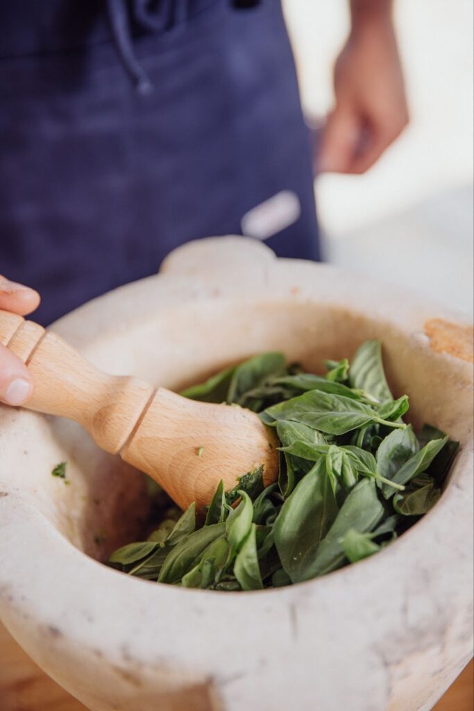 pestle with fresh basil