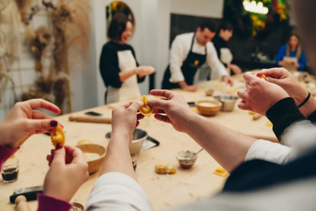 people making tortellini pasta