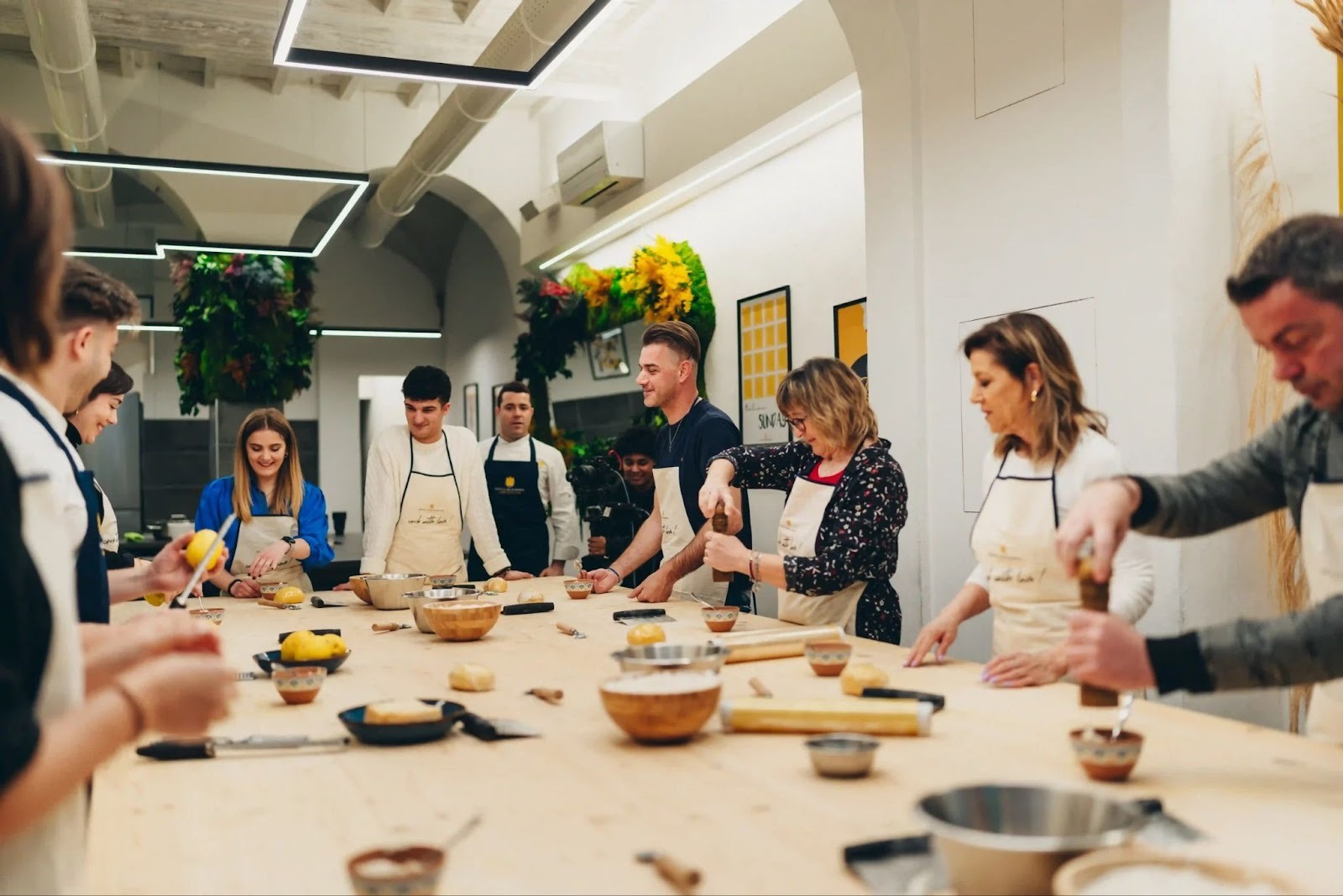 people doing a pasta cooking class