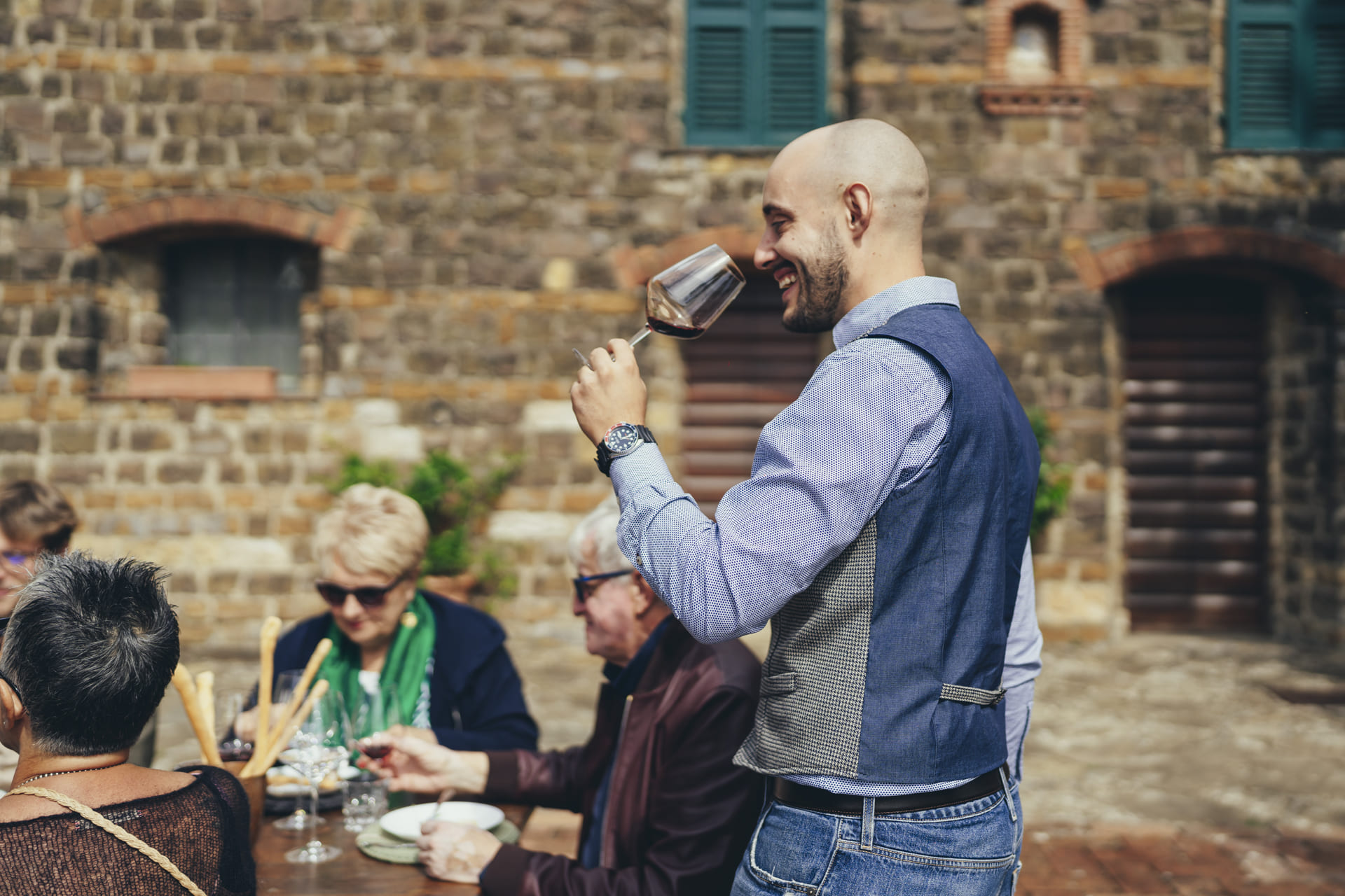 Tuscan wine and pasta served together on a table