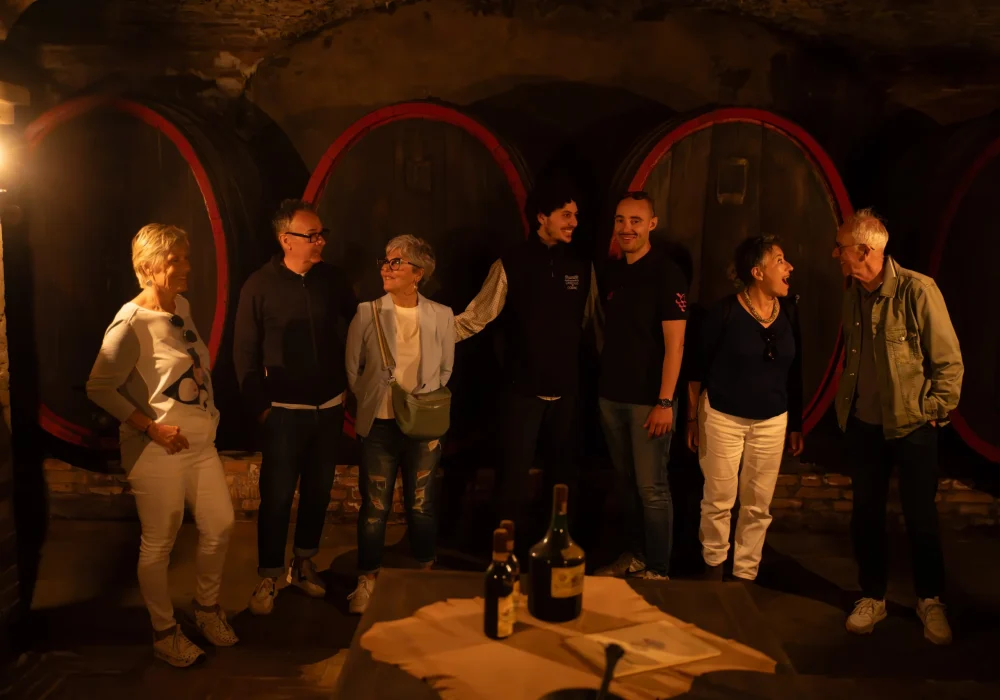 people in a wine cellar