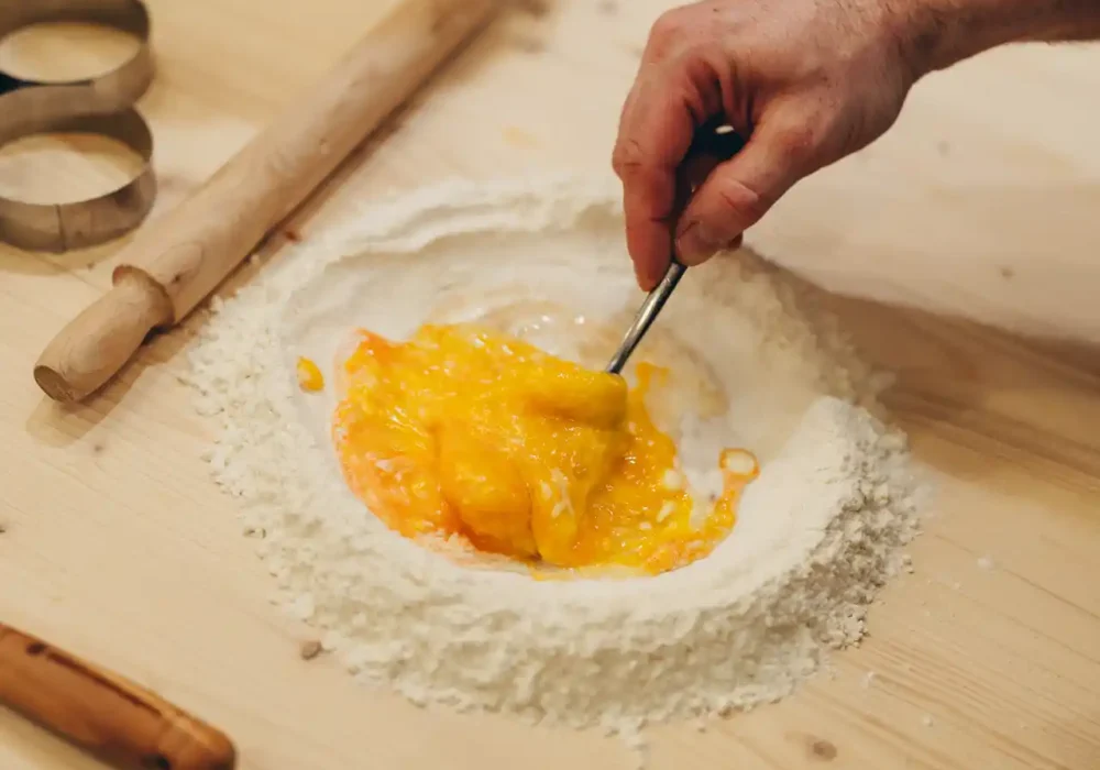 person making the dough