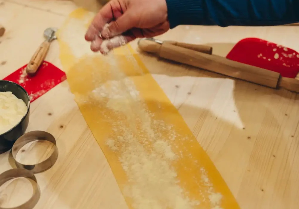people doing a cookin class with wine tasting