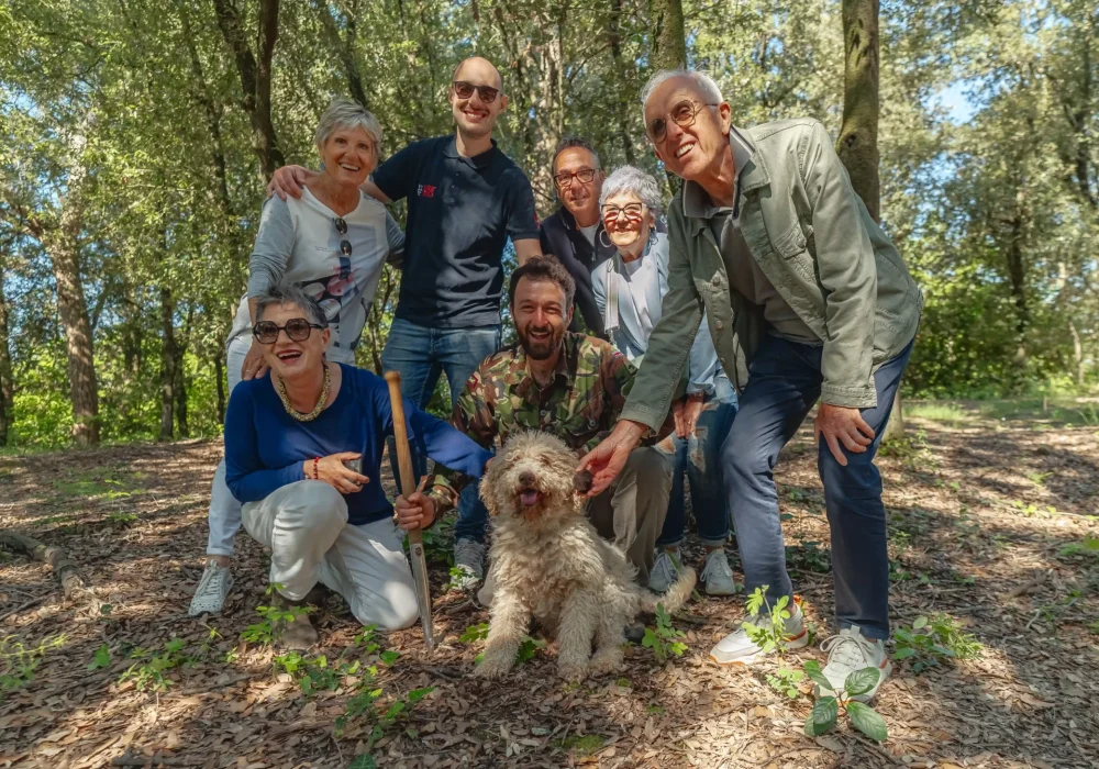 people with trained dog for hunt truffle